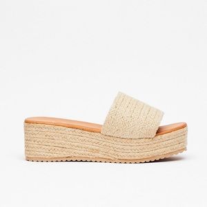 “You’re a Natural Woven Wedge Sandal” Nasty Gal